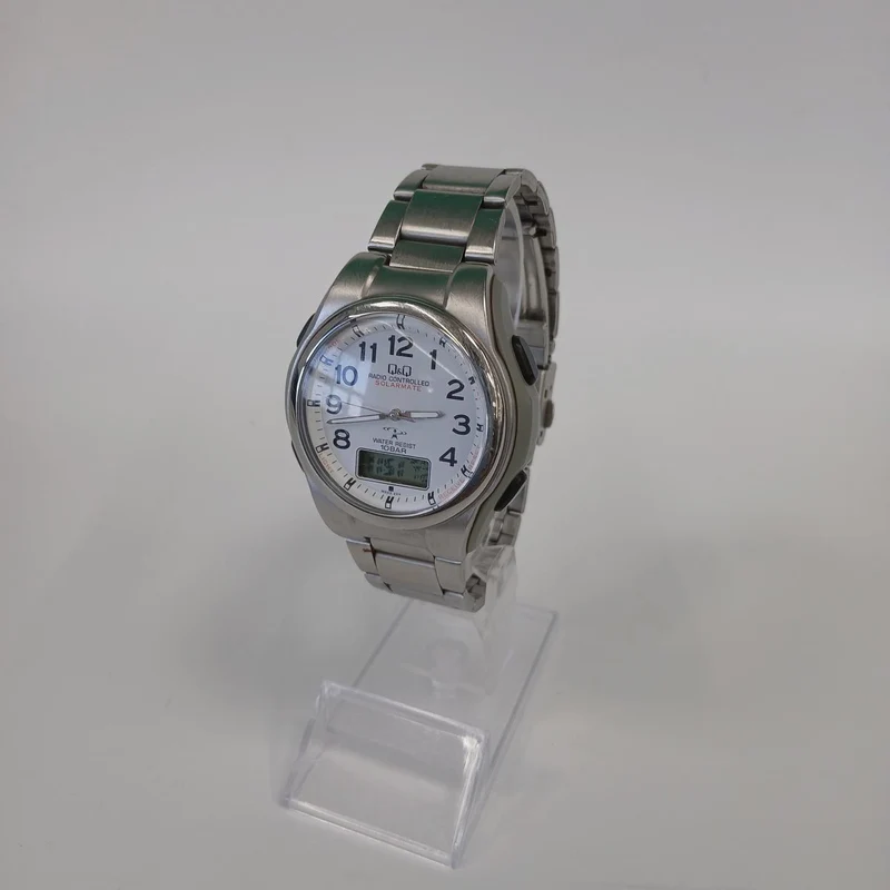 CITIZEN Q&Q Solar-Funkarmbanduhr MD02-204