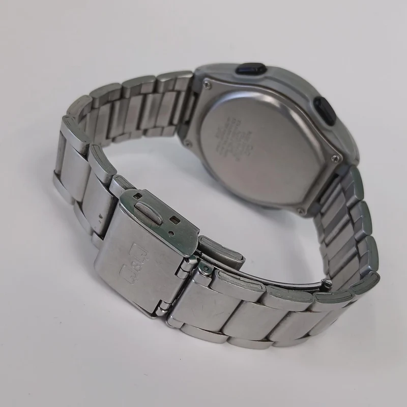 CITIZEN Q&Q Solar-Funkarmbanduhr MD02-204