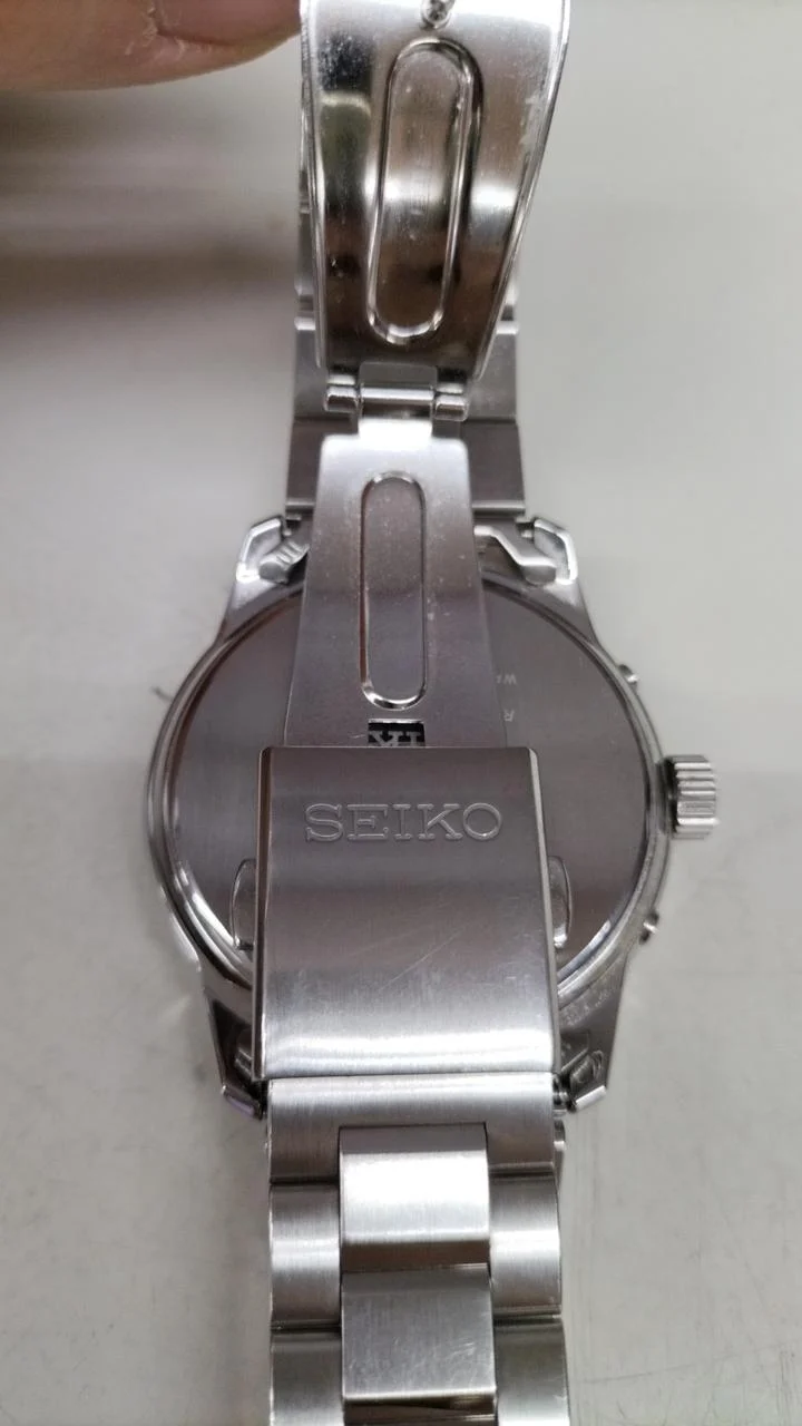 SEIKO Radio Solar (Marineblaues Zifferblatt) 7B24-0BR0 mit Kratzern auf dem Glas