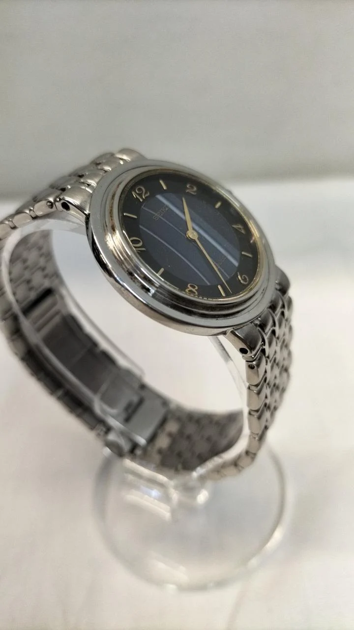SEIKO Quarz-Armbanduhr DOLCE 8N40-6050 18KT Gravur *Lünette fehlt